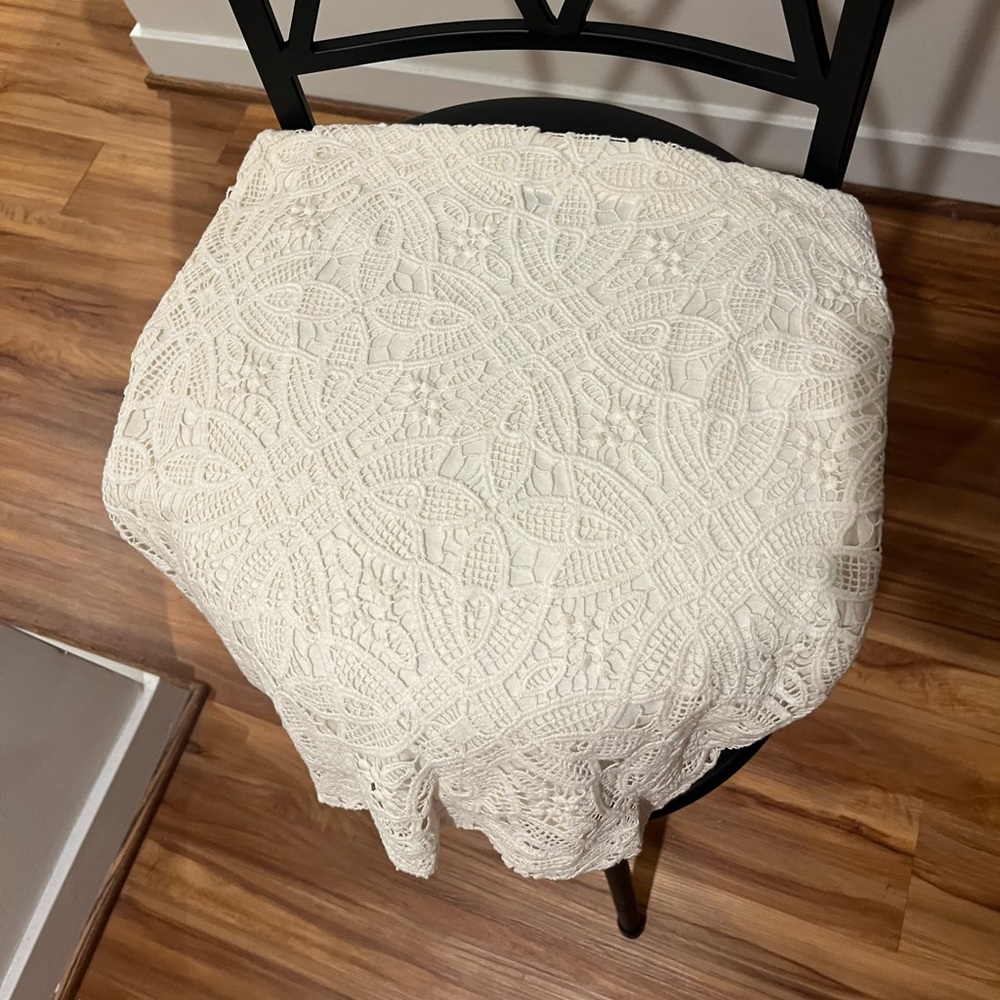 Cream skirt with lace pattern layered on top